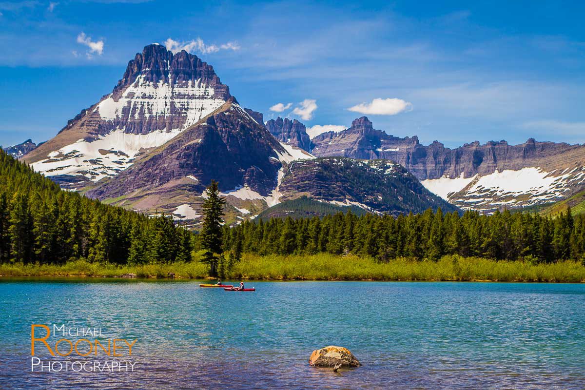 kayakers swiftcurrent lake glacier national park montana