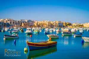 fishing boats harbor bay village marsaxlokk malta sunny tourism
