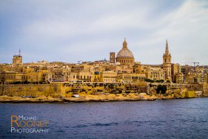 skyline urban valletta malta historic water bay dome mount carmel basilica cloudy