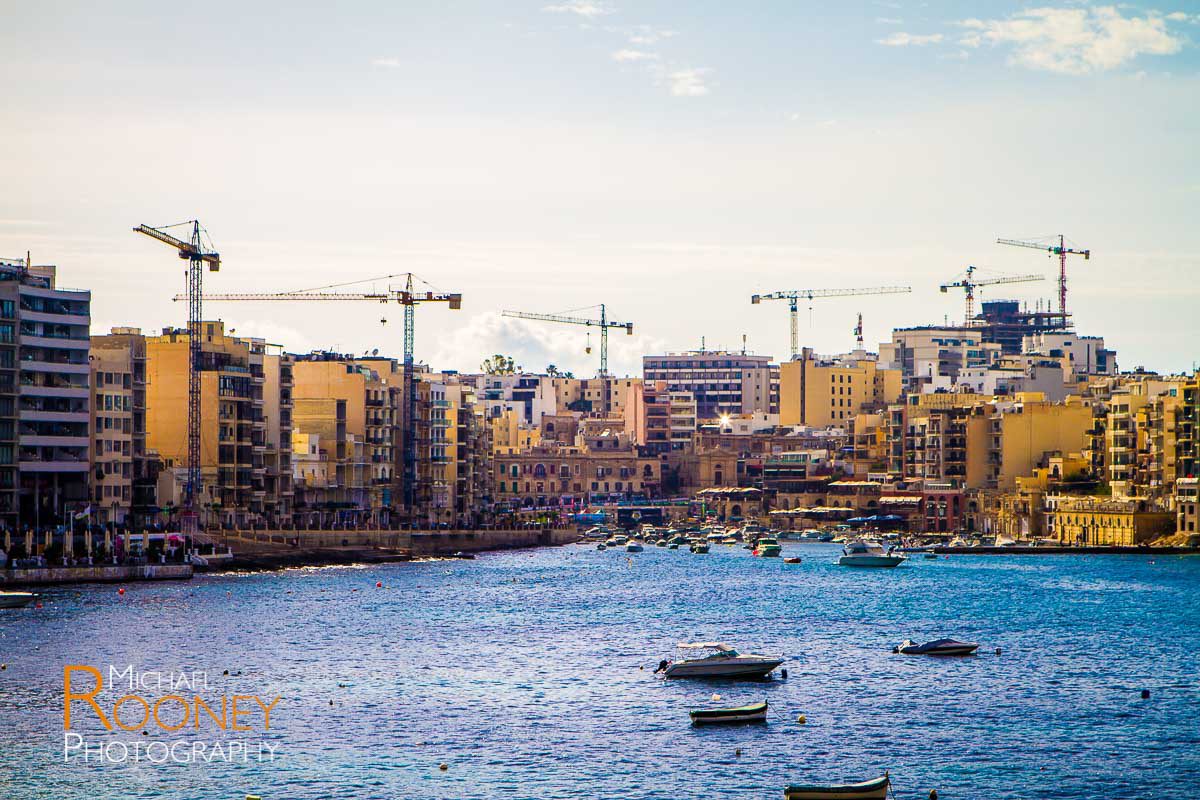 construction high rise towers apartments saint julian bay harbor boat malta urban