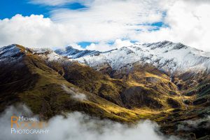 snow covered peak mountains valley thombu bhutan mist clouds