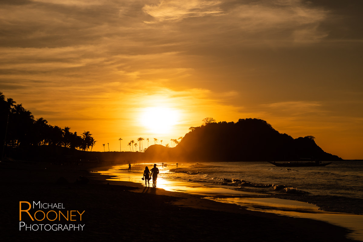 sunset silhouette nacpan beach el nido palawan philippines